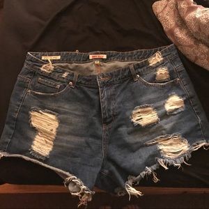 Ripped, distressed jean shorts
